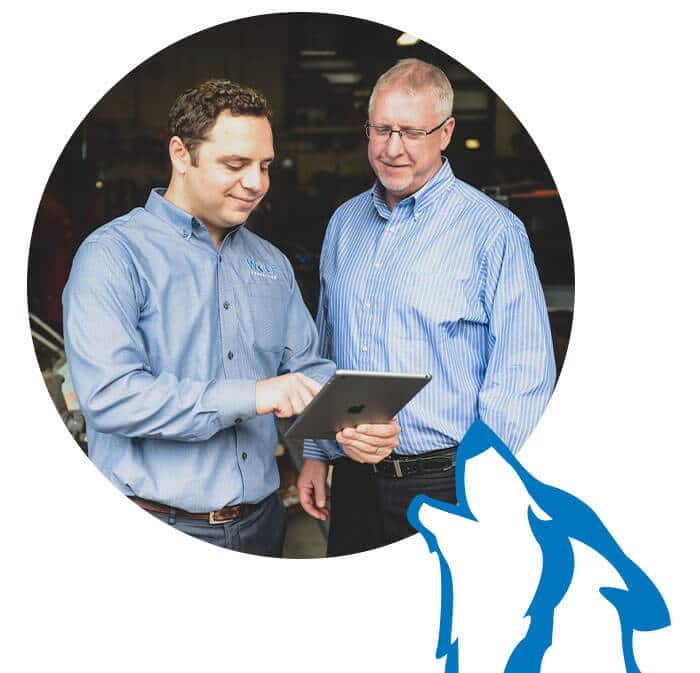 wolf-moon-about-us Wolf consulting information technology experts discussing IT services