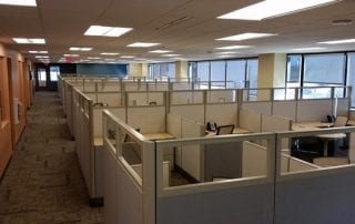 Workplace showing cubicles and business technology